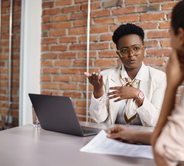 Two women meeting in office