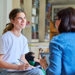 Student talking to advisor