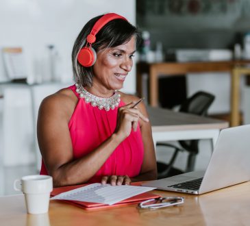 Person sitting at desk working on computer
