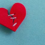 Felt heart stitched together in the middle