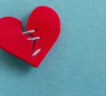 Felt heart stitched together in the middle