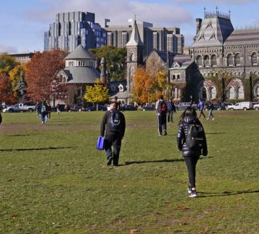 Students walk across the University of Toronto campus