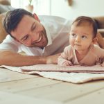 Dad with baby at home