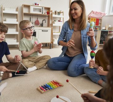 Young children with teacher in classroom