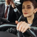 Taxi driver with passenger in back