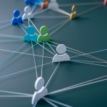 Web of icons of people connected by strings